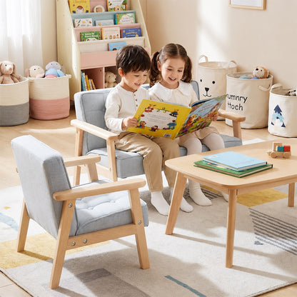Graues Kindersofa in einer hellen und modernen Kinderzimmer-Leseecke