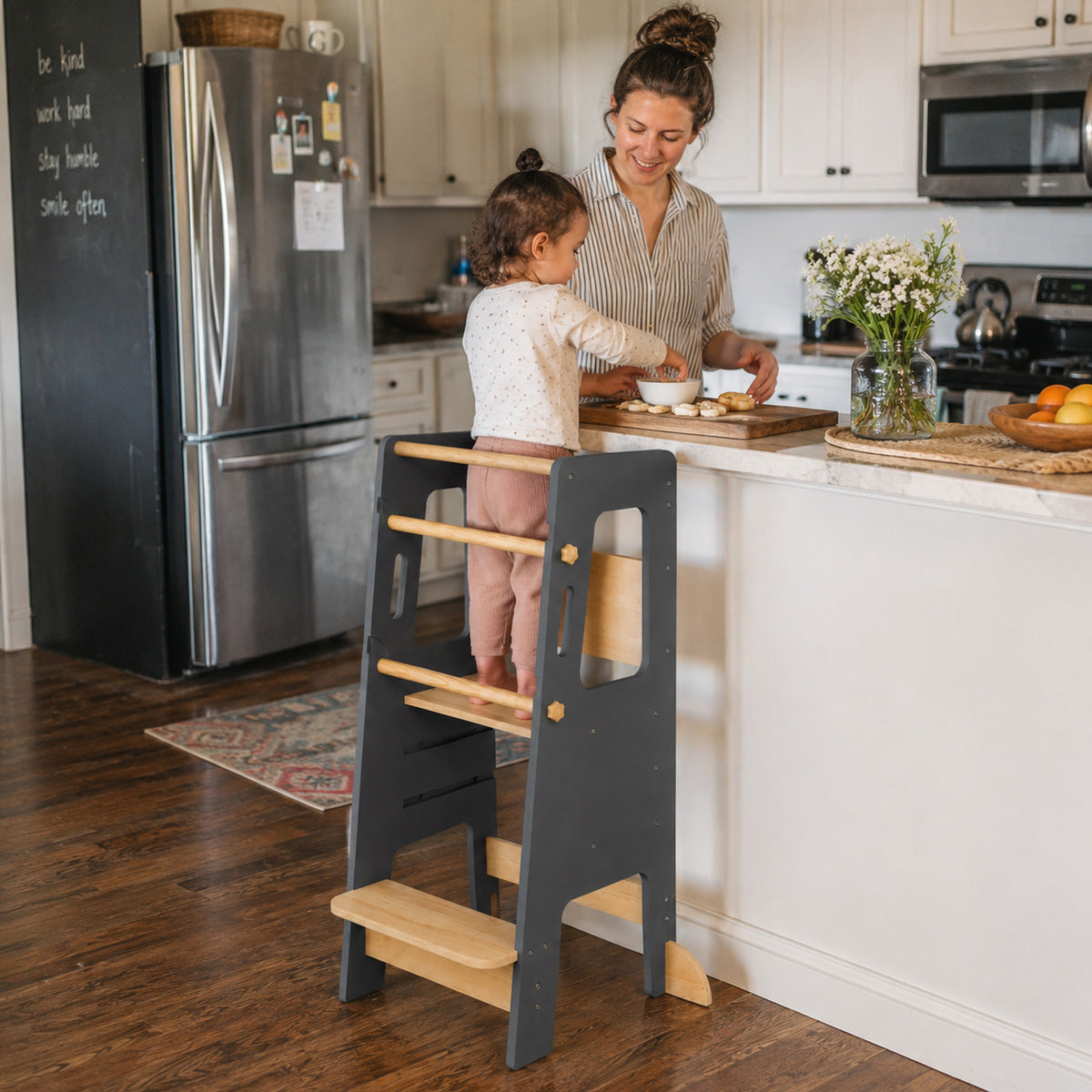 Adjustable wooden learning tower supporting children as they grow