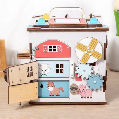 Montessori Busy House aus Holz mit Kugelbahn, Schlössern und Motorikspielen für Kinder ab 3 Jahren