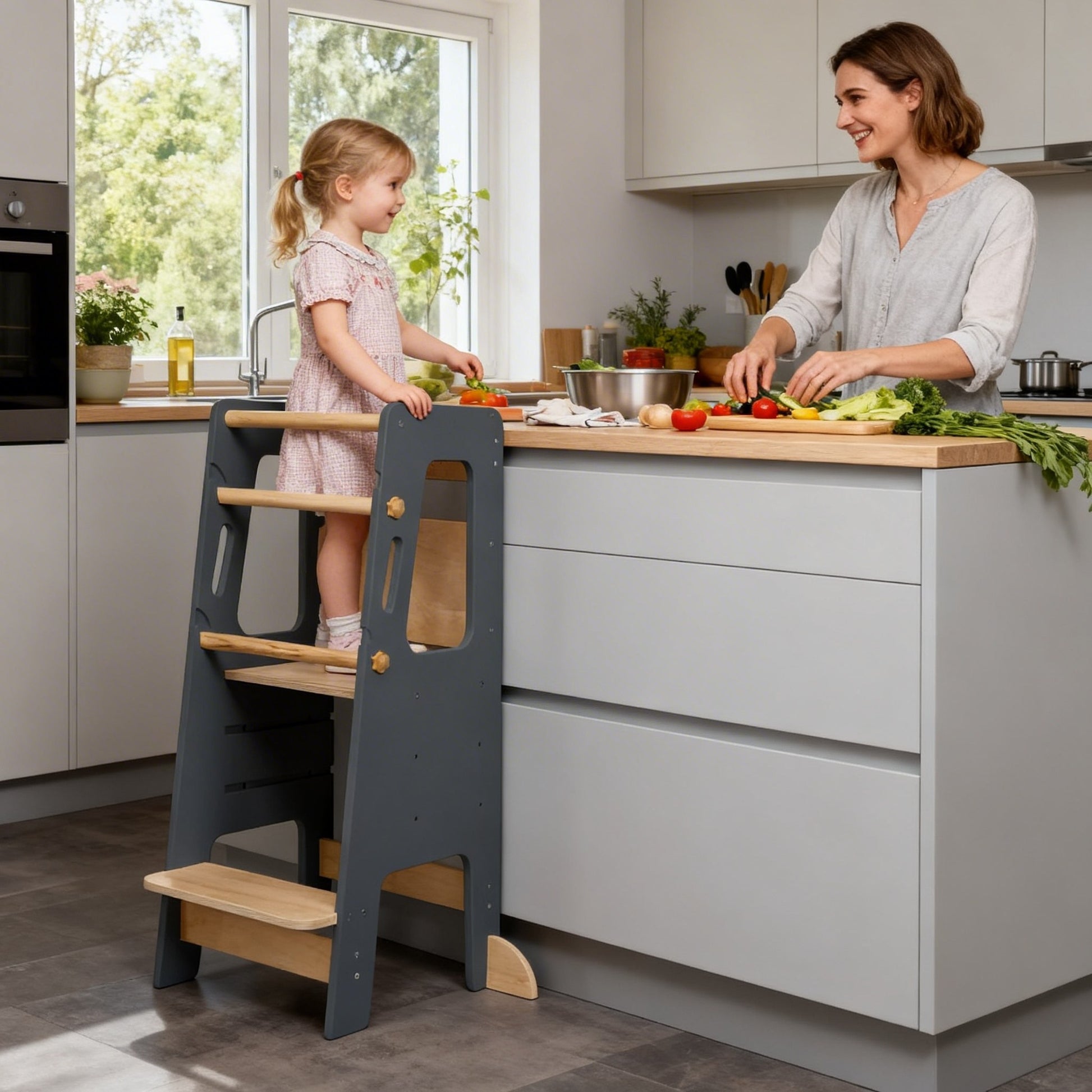 Montessori kitchen helper tower helping toddlers safely join cooking and household activities